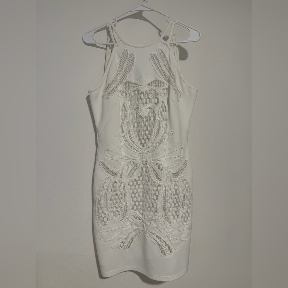 Chic White Dress with Intricate Detailing